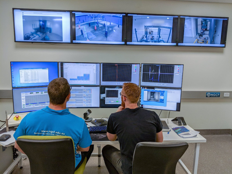 Reviewing experiment results in the NGCF office.